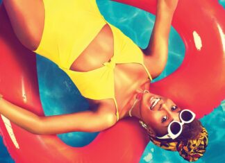 A woman in a yellow swimsuit relaxes on a red float in the pool for Insecure Tv Series, 4K Desktop Wallpaper