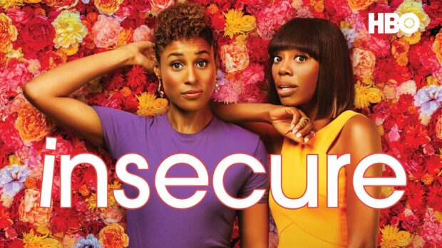 Two women pose with colorful flowers behind them in Insecure tv series, HD Desktop Wallpaper