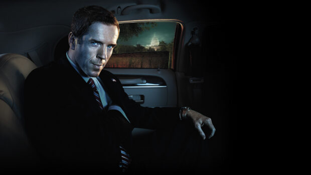 A man in a suit sits inside a car with the Capitol building visible outside the window in Homeland Wallpapers, HD Desktop Wallpaper