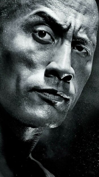 A detailed black and white portrait of Dwayne Johnson showing an intense expression, HD Phone Wallpaper