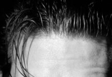 A black and white close up portrait showing Ralph Fiennes with a serious expression, HD Phone Wallpaper