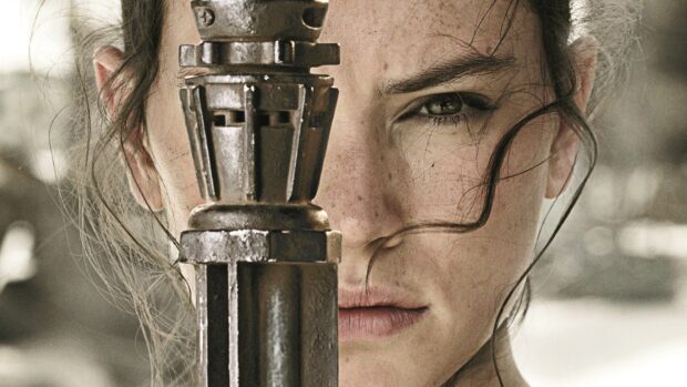 A close up shows a determined woman holding a metal staff with intense focus in Jj Abrams Wallpapers HD, HD Desktop Wallpaper