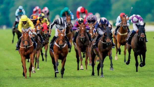 Several jockeys compete fiercely in a horse racing event, HD Desktop Wallpaper