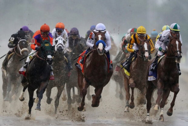 Several jockeys riding horses during a competitive horse racing event, HD Desktop Wallpaper