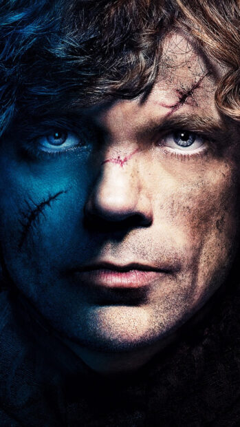 A close up of a man with scars showing his intense expression and blue eyes in House Lannister Wallpapers, 4K Phone Wallpaper