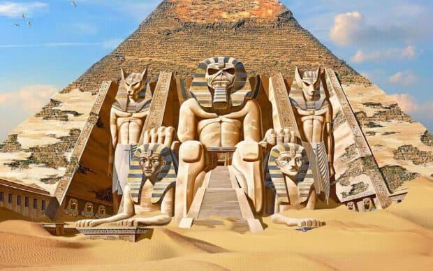 Iron Maiden band statue with Egyptian pyramid background in desert setting, HD Desktop Wallpaper