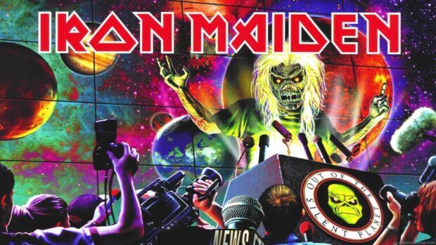 The Iron Maiden band artwork features a zombie like figure speaking at a press conference, HD Desktop Wallpaper