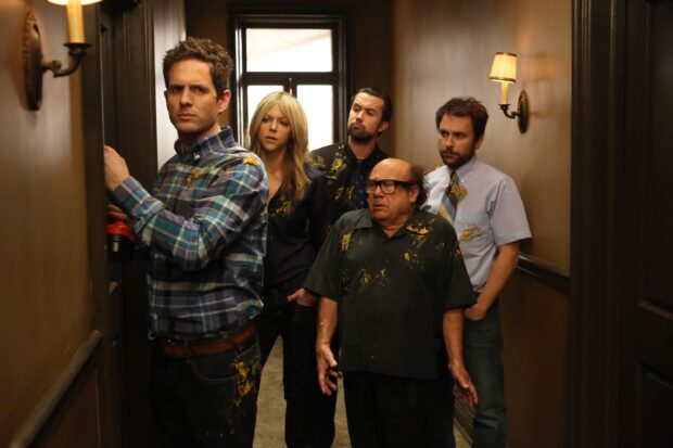 The cast of Its Always Sunny in Philadelphia is covered in mustard while standing in a hallway, 2K Desktop Wallpaper