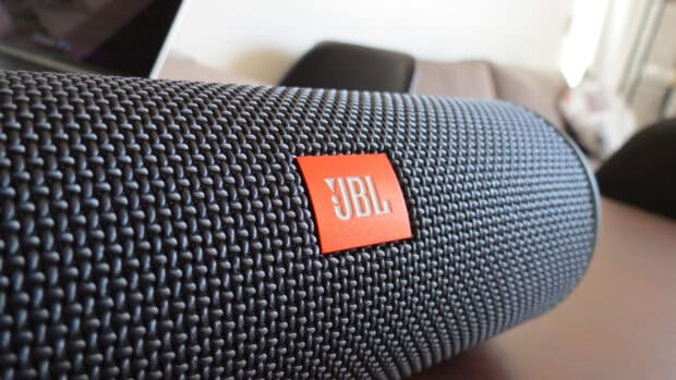 A close up view of a JBL speaker showing the detailed texture and logo, HD Desktop Wallpaper