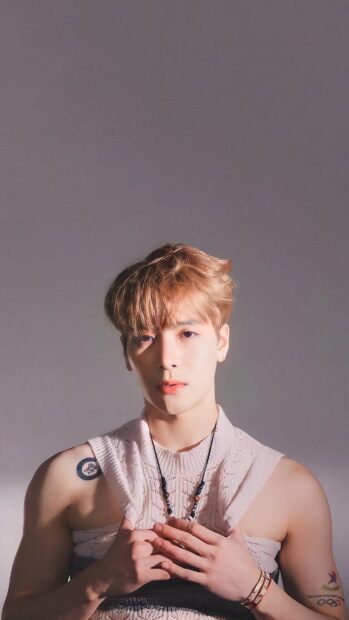 Jackson Wang wallpapers shows a close up portrait of a young man with styled hair, HD Phone Wallpaper