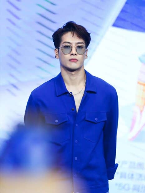 Jackson Wang wears a blue jacket and sunglasses during a public event, HD Mobile Wallpaper