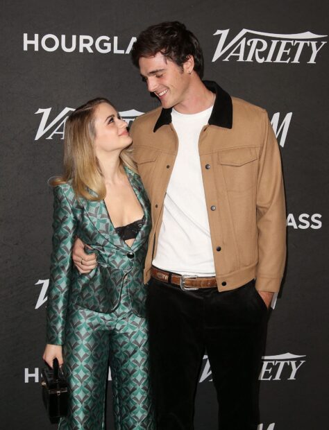 Jacob Elordi smiles warmly while posing at an event with a companion, HD Mobile Wallpaper