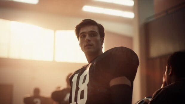 Jacob Elordi in football gear looking focused before a game, HD Desktop Wallpaper