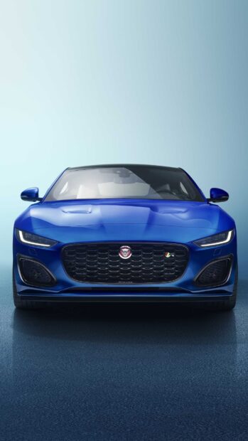 A blue Jaguar F Type is shown from the front with a clear grille and sleek headlights, 2K Phone Wallpaper