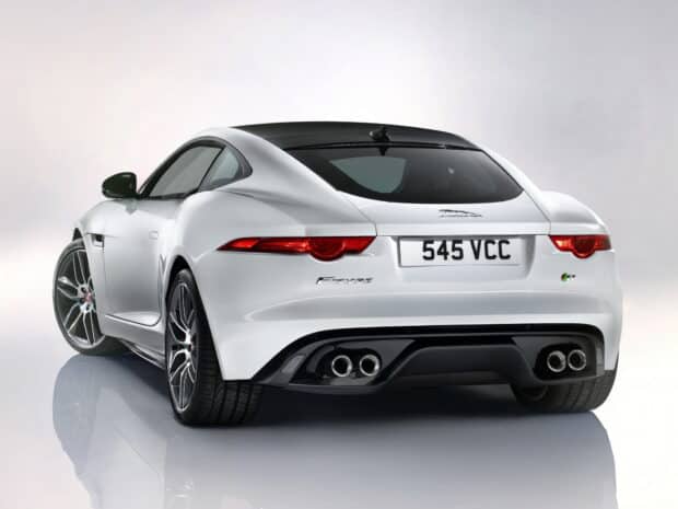 A white Jaguar F Type sports car is captured from the rear showing the taillights and dual exhausts, HD Desktop Wallpaper