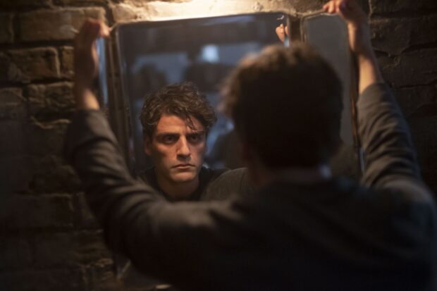 A man named Jake Lockley is looking intensely at his reflection in a mirror, HD Desktop Wallpaper