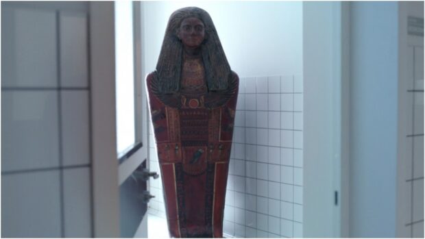 Jake Lockley wallpapers featuring an Egyptian sarcophagus in a modern room, HD Desktop Wallpaper