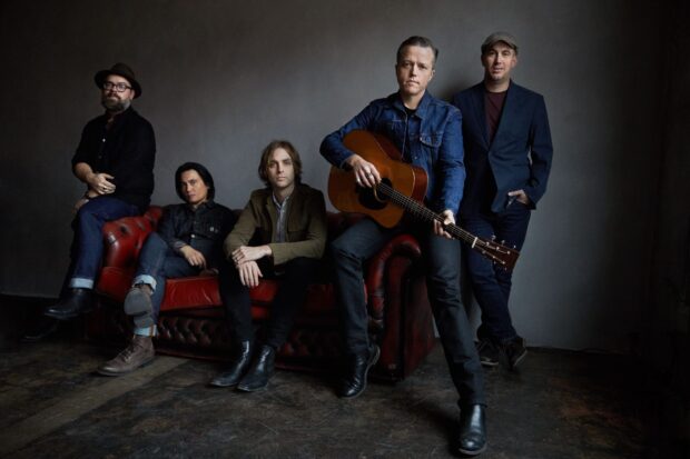 Jason Isbell and his band pose for a group photo with an acoustic guitar, HD Desktop Wallpaper