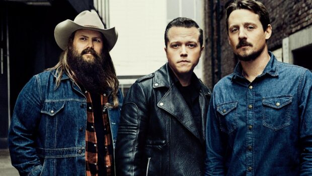 The Jason Isbell group poses in leather and denim jackets in an alley, HD Desktop Wallpaper