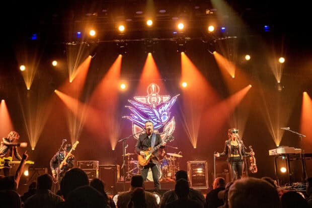 Jason Isbell performs live on stage with his band during a dynamic show, HD Desktop Wallpaper