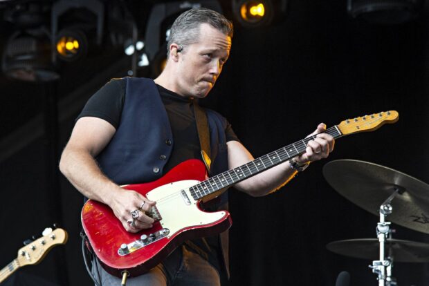 Jason Isbell is performing live on stage with an electric guitar, HD Desktop Wallpaper