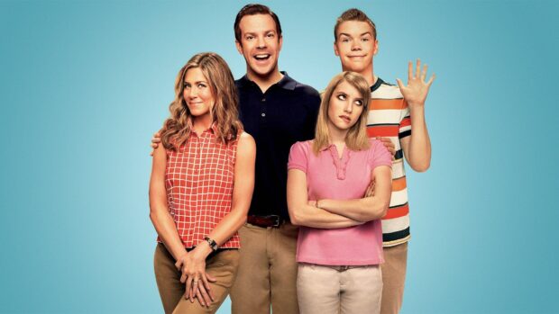 Jason Sudeikis and three co stars posing in colorful outfits on blue, HD Desktop Wallpaper