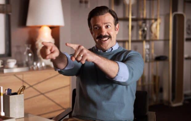 Jason Sudeikis wallpapers shows him smiling and pointing with both hands, HD Desktop Wallpaper
