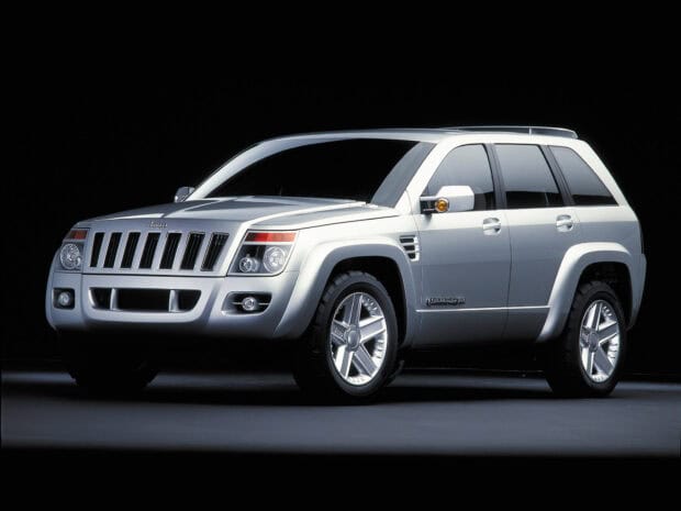 A silver Jeep Commander is shown from the front right side against a black background, Jeep Commander Wallpapers, HD Desktop Wallpaper