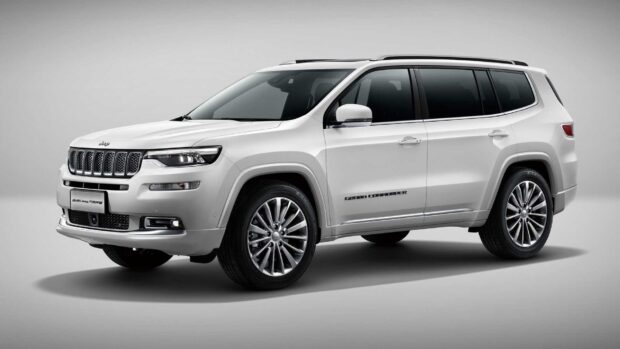 A white Jeep Commander is shown from the side against a plain background, HD Desktop Wallpaper