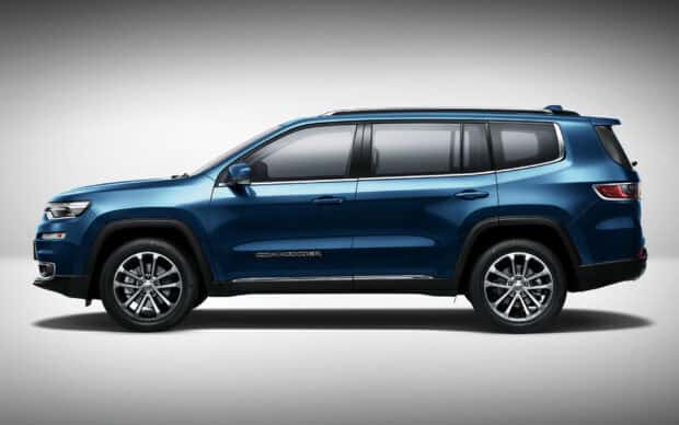 The blue Jeep Commander showcases a sleek side profile against a plain background, HD Desktop Wallpaper