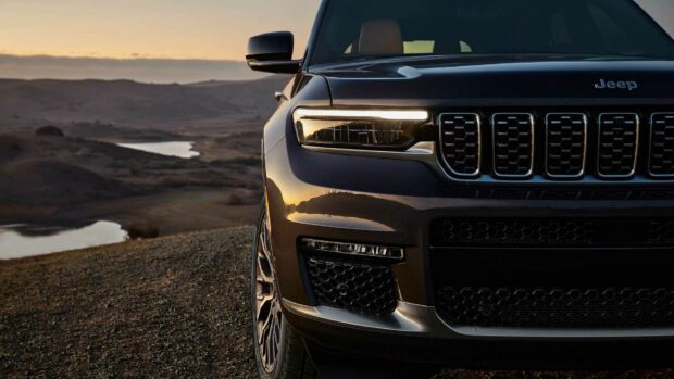 The Jeep Grand Cherokee is parked with a mountain landscape at sunset, HD Desktop Wallpaper