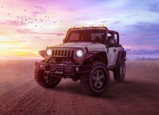 A Jeep is parked on a desert ground under a colorful sunset sky with birds flying, 4K Desktop Wallpaper