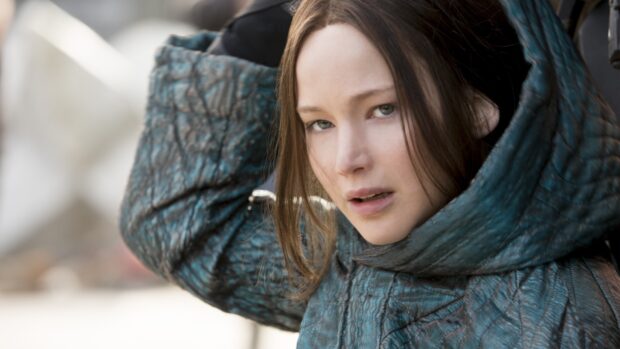 Jennifer Lawrence wearing a textured coat in a close up from The Hunger Games, HD Desktop Wallpaper