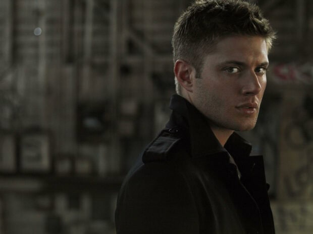Jensen Ackles looks intensely towards the camera with a dark background, HD Desktop Wallpaper