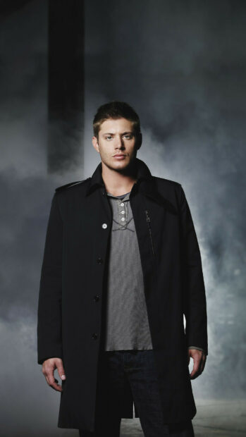 Jensen Ackles stands wearing a black coat with a smoky background, HD Phone Wallpaper
