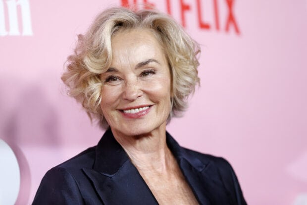 Jessica Lange smiles warmly with short curly hair, 2K Desktop Wallpaper