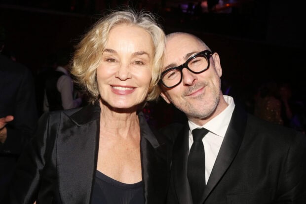 Jessica Lange is smiling warmly in the photo with a man dressed in a black tuxedo, HD Desktop Wallpaper