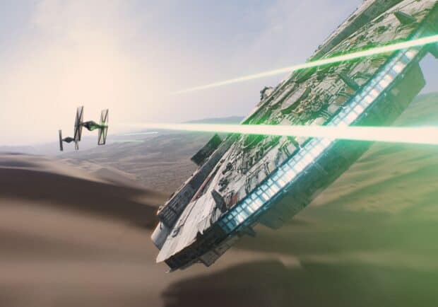 A Jj Abrams spaceship fires green lasers over a desert landscape, HD Desktop Wallpaper