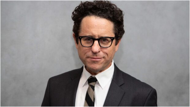 Jj Abrams wears a suit and glasses with a neutral gray background, HD Desktop Wallpaper