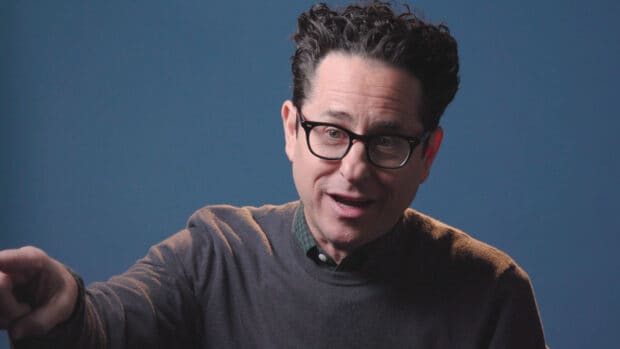 Jj Abrams smiles and gestures during an interview with a blue background, 4K Desktop Wallpaper
