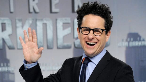 Jj Abrams is smiling and waving while wearing glasses and a suit, HD Desktop Wallpaper