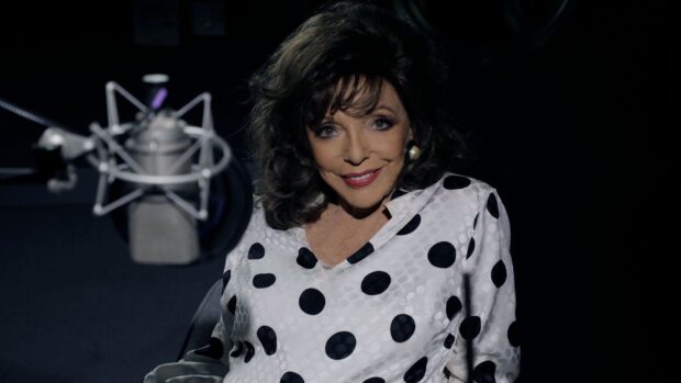 Joan Collins smiles warmly wearing a polka dot blouse, HD Desktop Wallpaper