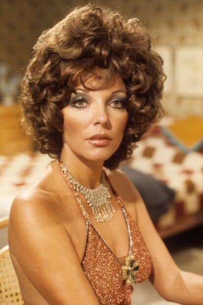 Joan Collins wallpapers showing a woman with curly hair and sparkling attire, HD Mobile Wallpaper