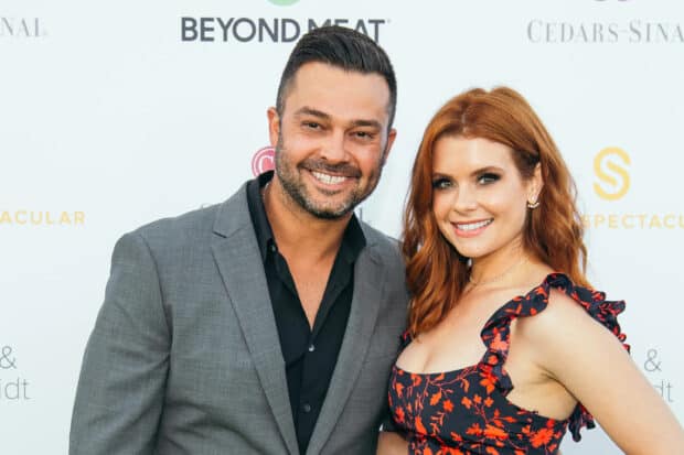 Joanna Garcia Swisher and a man posing happily at an event, 2K Desktop Wallpaper
