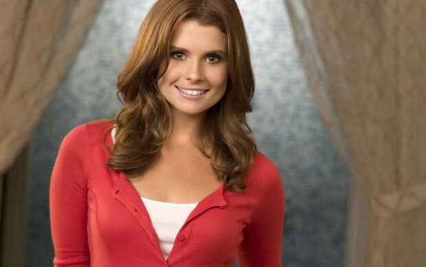 Joanna Garcia Swisher smiles warmly wearing a red cardigan over a white top, HD Desktop Wallpaper