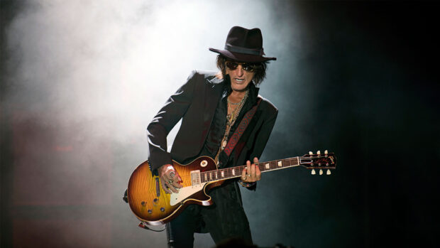 Joe Perry passionately playing electric guitar on stage, HD Desktop Wallpaper