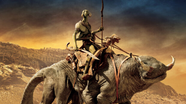 A John Carter Wallpapers character rides a large horned creature in a desert landscape, HD Desktop Wallpaper