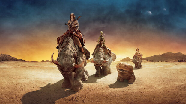 John Carter Wallpapers shows characters riding unusual beasts in a desert landscape, HD Desktop Wallpaper