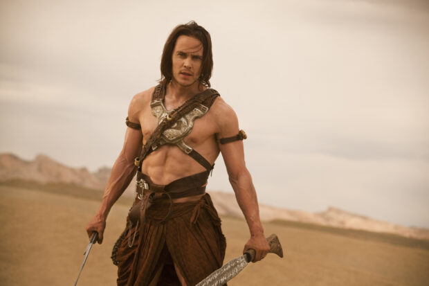 A muscular man holding blades in a desert scene from John Carter Wallpapers, HD Desktop Wallpaper