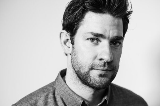 John Krasinski looks thoughtfully into the camera in a close up black and white portrait, HD Desktop Wallpaper